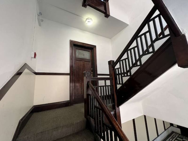 1059 E Hyde Park Blvd Unit 1, Chicago, IL 60615 - stairway with carpet floors and baseboards