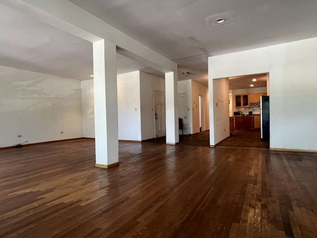 1059 E Hyde Park Blvd Unit 1, Chicago, IL 60615 - unfurnished living room with dark wood finished floors and baseboards