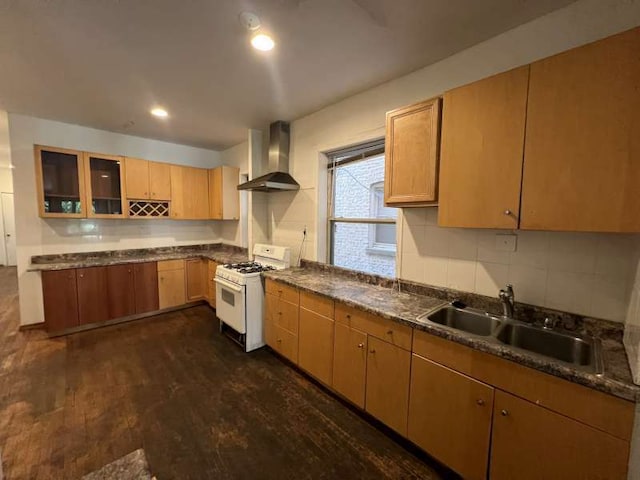 1059 E Hyde Park Blvd Unit 1, Chicago, IL 60615 - kitchen with gas range gas stove, wall chimney exhaust hood, glass insert cabinets, tasteful backsplash, and dark countertops