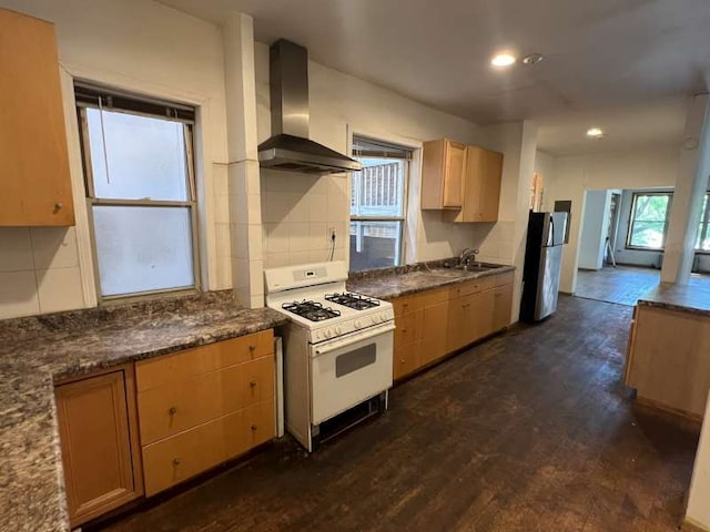 1059 E Hyde Park Blvd Unit 1, Chicago, IL 60615 - kitchen featuring wall chimney range hood, white gas range, freestanding refrigerator, dark wood-style floors, and dark countertops