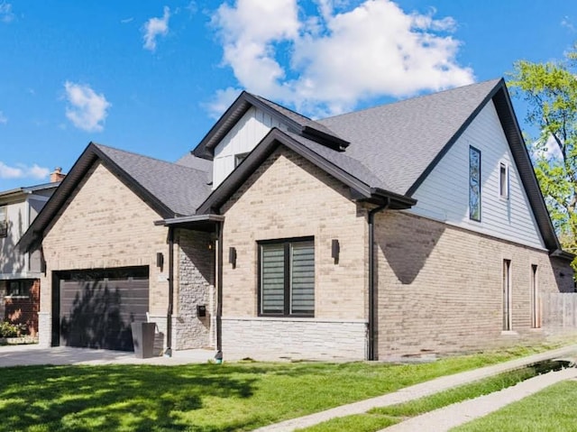 7929 N Octavia Ave, Niles, IL 60714 - view of front of property with a garage, a front lawn, brick siding, and board and batten siding