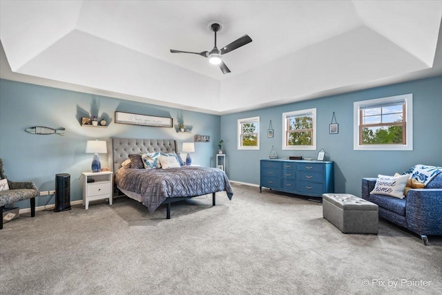 1714 Tall Tree Ln, Johnsburg, IL 60051 - bedroom with a raised ceiling, light carpet, multiple windows, ceiling fan, and lofted ceiling