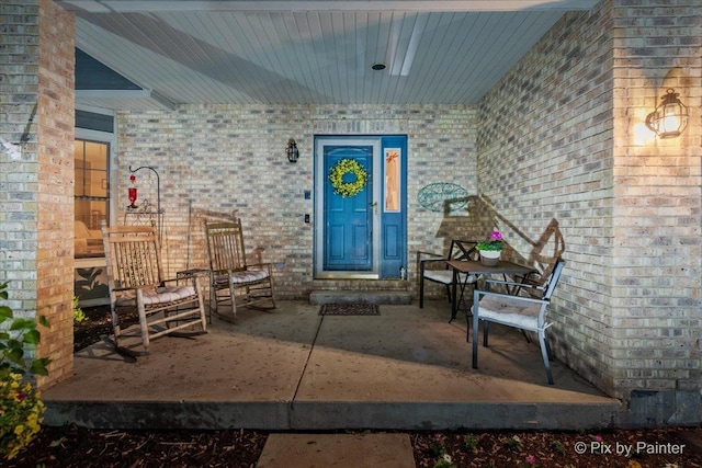 1714 Tall Tree Ln, Johnsburg, IL 60051 - entrance to property with brick siding and a porch