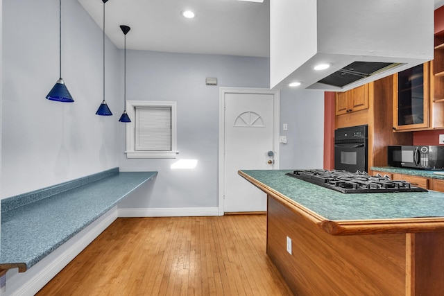 1027 N Harlem Ave, Oak Park, IL 60302 - kitchen with black appliances, brown cabinetry, extractor fan, glass insert cabinets, and light wood-style floors