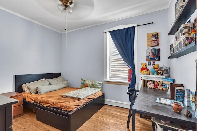 1027 N Harlem Ave, Oak Park, IL 60302 - bedroom featuring wood finished floors, crown molding, and a ceiling fan