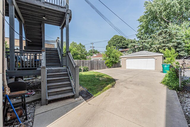 1027 N Harlem Ave, Oak Park, IL 60302 - view of yard featuring stairs, an outbuilding, and a garage