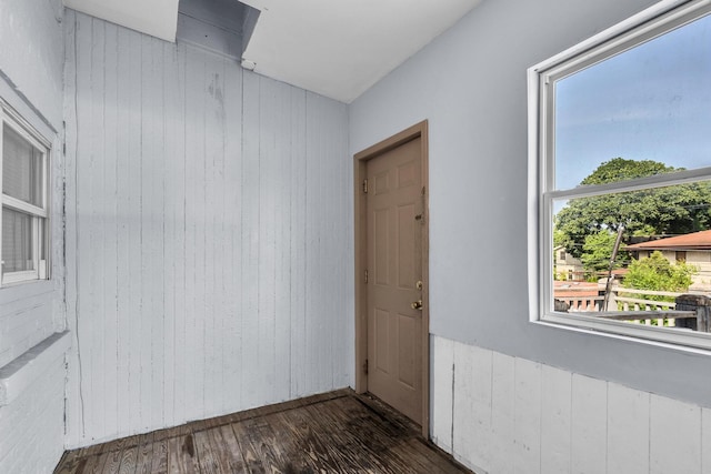 1027 N Harlem Ave, Oak Park, IL 60302 - spare room featuring wood finished floors and wooden walls