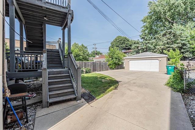 1027 N Harlem Ave, Oak Park, IL 60302 - view of yard featuring stairs, an outbuilding, and a detached garage