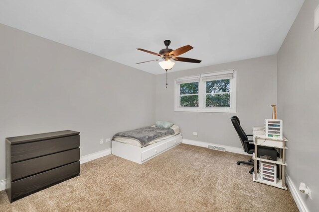 1810 Jana Ln, Morris, IL 60450 - bedroom featuring carpet, an office area, and a ceiling fan