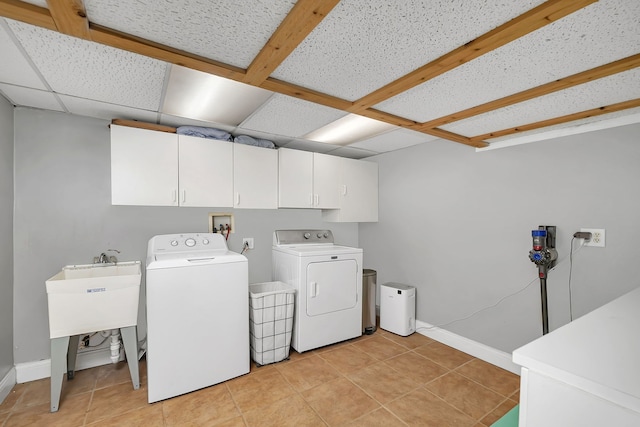 1810 Jana Ln, Morris, IL 60450 - washroom with separate washer and dryer, cabinet space, and light tile patterned floors