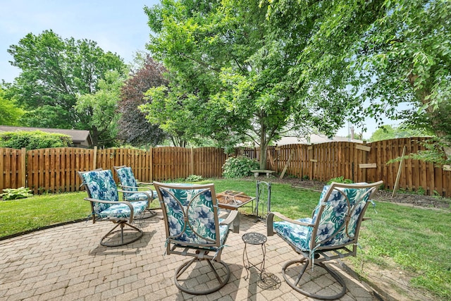 1810 Jana Ln, Morris, IL 60450 - fenced backyard with an outdoor fire pit and a patio area