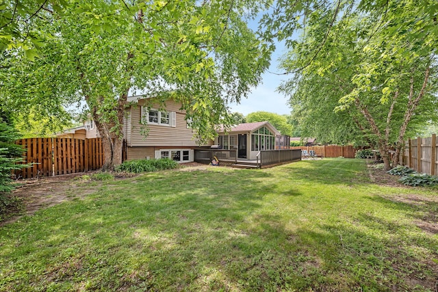 1810 Jana Ln, Morris, IL 60450 - fenced backyard with a deck and a sunroom