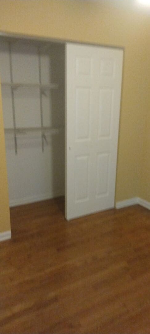509 Barbara Ct S, University Park, IL 60484 - unfurnished bedroom featuring wood finished floors and baseboards