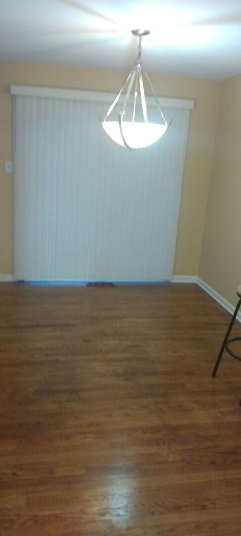 509 Barbara Ct S, University Park, IL 60484 - spare room featuring wood finished floors