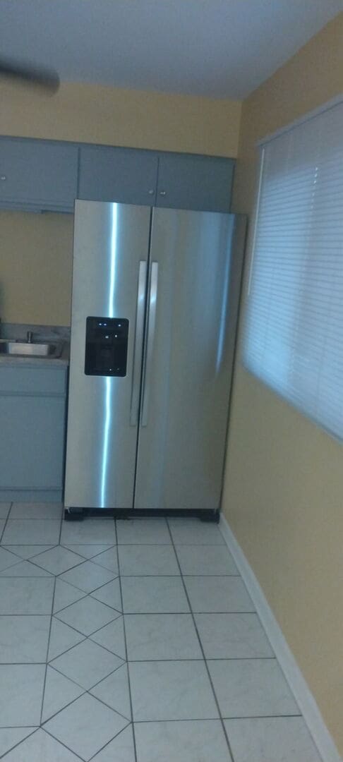 509 Barbara Ct S, University Park, IL 60484 - kitchen view of stainless steel fridge and a sink
