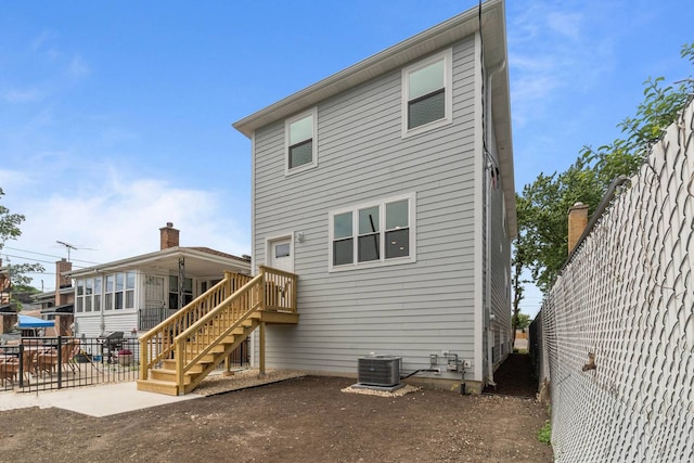 7431 W Forest Preserve Ave, Chicago, IL 60634 - back of house featuring stairway