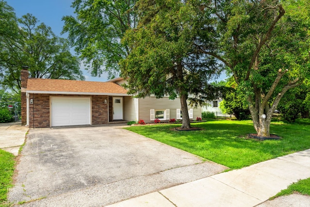 337 E Briarcliff Rd, Bolingbrook, IL 60440 - split level home featuring driveway, a chimney, a garage, and a front lawn
