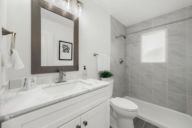 337 E Briarcliff Rd, Bolingbrook, IL 60440 - full bathroom featuring vanity and tiled shower