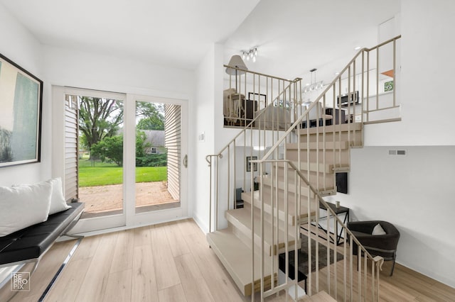 337 E Briarcliff Rd, Bolingbrook, IL 60440 - stairs featuring wood finished floors and baseboards