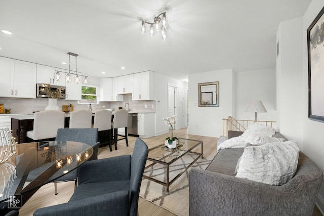 337 E Briarcliff Rd, Bolingbrook, IL 60440 - living room featuring light wood-style floors and recessed lighting