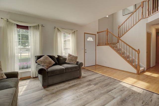 2799 Squaw Valley Trl, Aurora, IL 60503 - living room with light wood finished floors and stairs