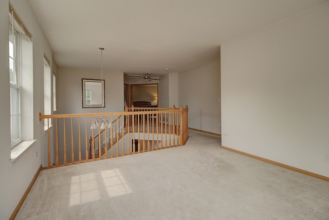 2799 Squaw Valley Trl, Aurora, IL 60503 - spare room featuring ceiling fan and carpet floors