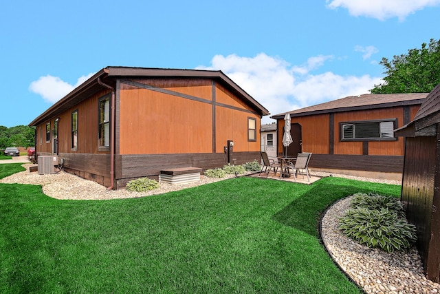 1178 Barry Ln, Sauk Village, IL 60411 - back of house with a lawn and a patio area