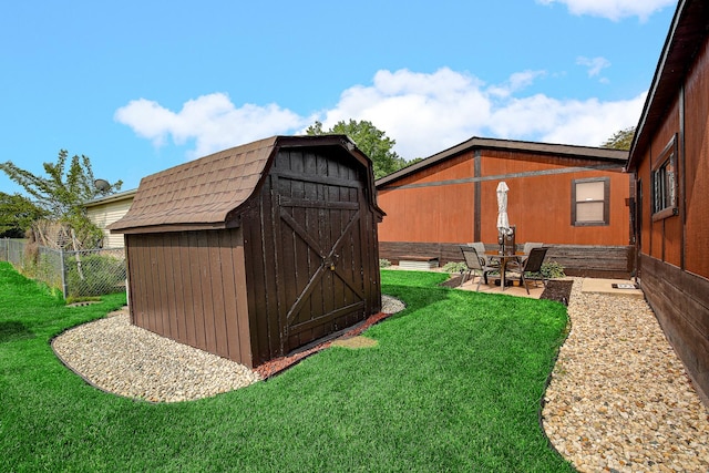 1178 Barry Ln, Sauk Village, IL 60411 - view of yard featuring a storage shed and a patio