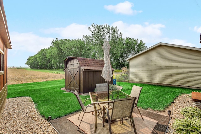 1178 Barry Ln, Sauk Village, IL 60411 - view of patio with a shed and outdoor dining area