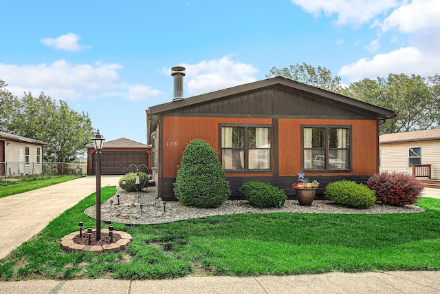 1178 Barry Ln, Sauk Village, IL 60411 - view of front facade with a front lawn