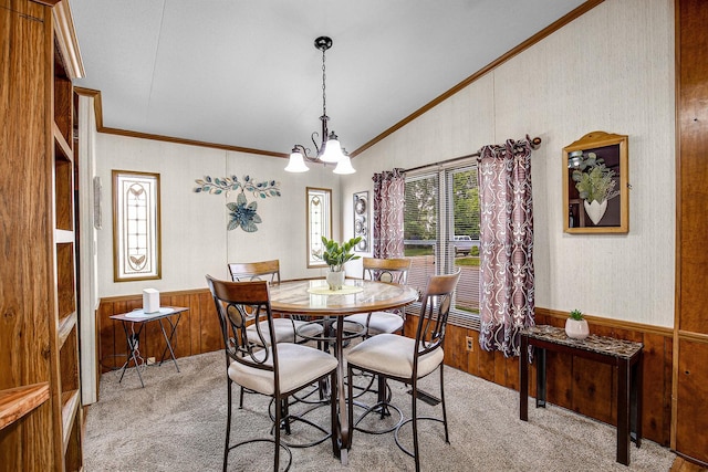 1178 Barry Ln, Sauk Village, IL 60411 - dining room with carpet flooring, vaulted ceiling, crown molding, wood walls, and a chandelier