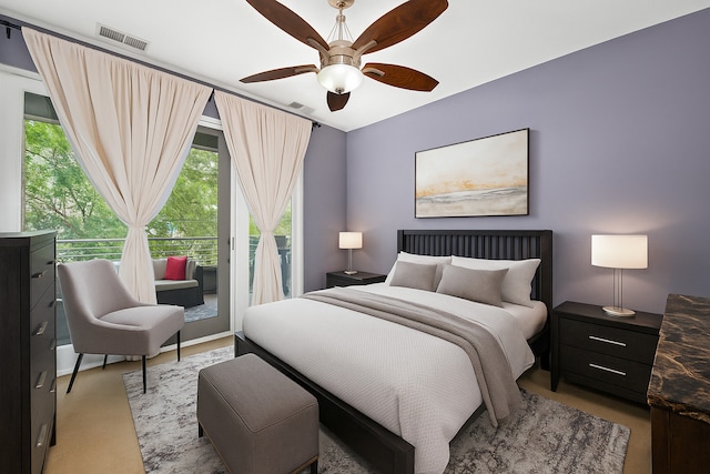 3021 W Armitage Ave Unit 201, Chicago, IL 60647 - bedroom with access to outside, ceiling fan, and light colored carpet
