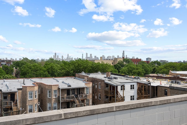 3021 W Armitage Ave Unit 201, Chicago, IL 60647 - balcony featuring a skyline view