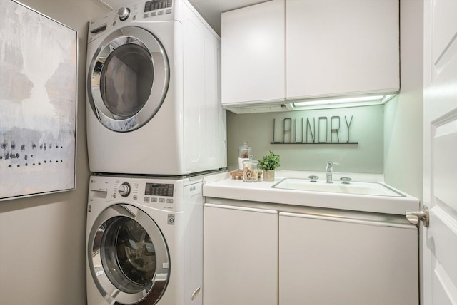161 E Chicago Ave Unit 49B, Chicago, IL 60611 - laundry room featuring stacked washer / drying machine and cabinet space