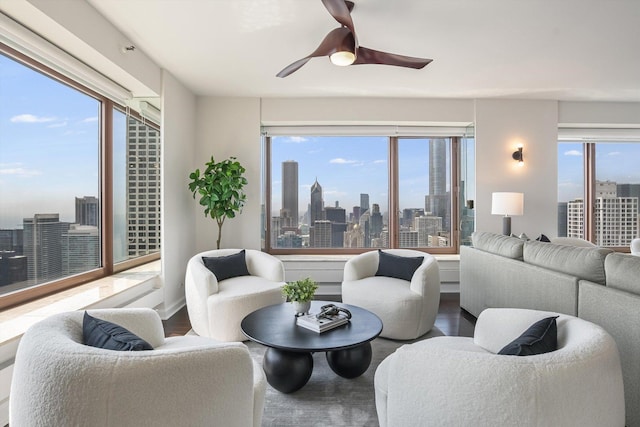161 E Chicago Ave Unit 49B, Chicago, IL 60611 - living area featuring a view of skyline, a ceiling fan, and wood finished floors