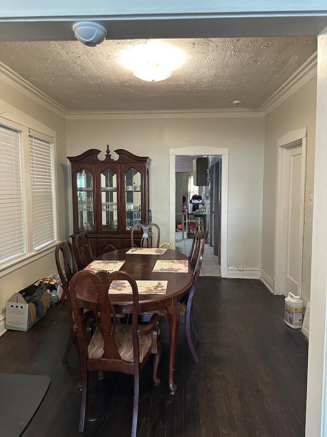 1519 E 76th Pl, Chicago, IL 60619 - dining room featuring hardwood / wood-style flooring, ornamental molding, and a textured ceiling