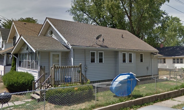 1319 Fairview Ave, Rockford, IL 61101 - view of front of house featuring roof with shingles