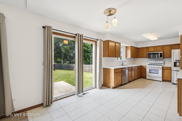 2664 Stuart Kaplan Dr, Aurora, IL 60503 - unfurnished living room featuring light colored carpet and vaulted ceiling