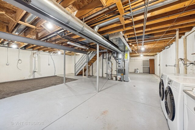 2664 Stuart Kaplan Dr, Aurora, IL 60503 - below grade area with independent washer and dryer and a sink