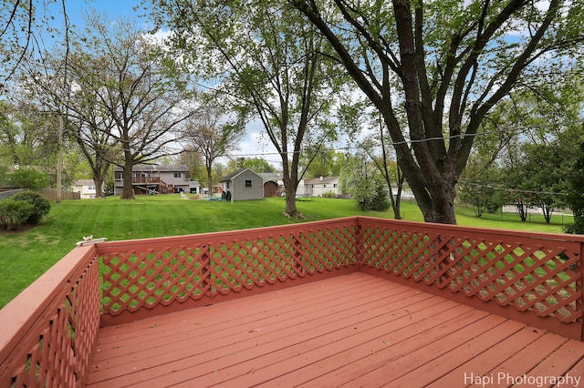 1113 Rolling Lane Rd, Johnsburg, IL 60051 - deck with a lawn, a residential view, and an outdoor structure