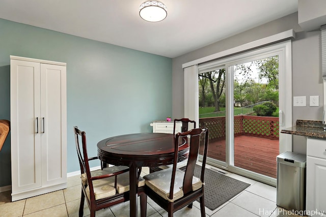 1113 Rolling Lane Rd, Johnsburg, IL 60051 - dining area featuring light tile patterned floors and baseboards