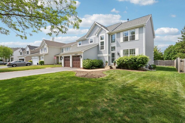 18485 W Springwood Dr, Grayslake, IL 60030 - view of front of property with asphalt driveway and a garage