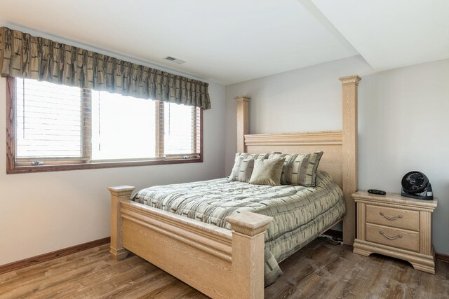 13707 W Carefree Dr, Homer Glen, IL 60491 - bedroom with wood finished floors and baseboards