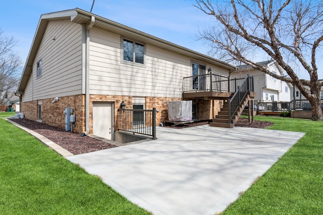 13707 W Carefree Dr, Homer Glen, IL 60491 - rear view of property featuring a deck, a patio area, a lawn, and brick siding
