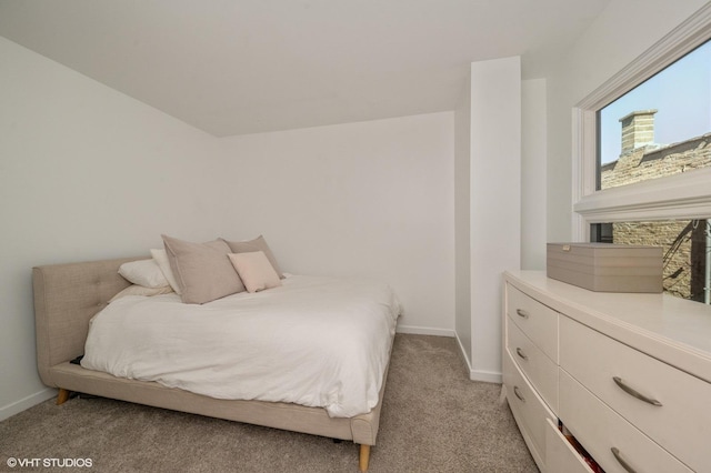1719 N Halsted St Unit C, Chicago, IL 60614 - bedroom featuring baseboards and light carpet