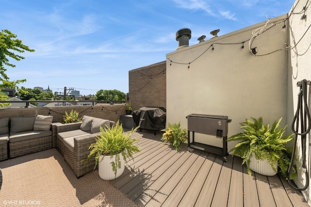 1719 N Halsted St Unit C, Chicago, IL 60614 - wooden terrace featuring grilling area and outdoor lounge area
