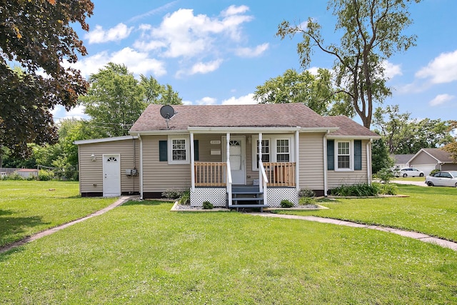 2110 E Erzinger St, Kankakee, IL 60901 - view of front of house with covered porch and a front yard