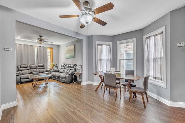 4036 N Bernard St, Chicago, IL 60618 - dining space with ceiling fan and wood finished floors