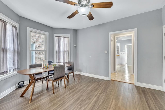 4036 N Bernard St, Chicago, IL 60618 - dining room featuring light wood-type flooring and a ceiling fan