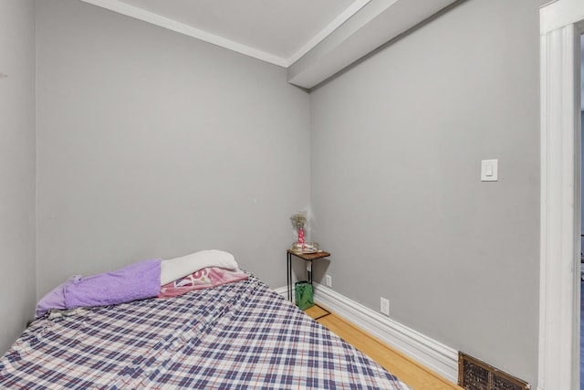 4036 N Bernard St, Chicago, IL 60618 - bedroom featuring wood finished floors and crown molding